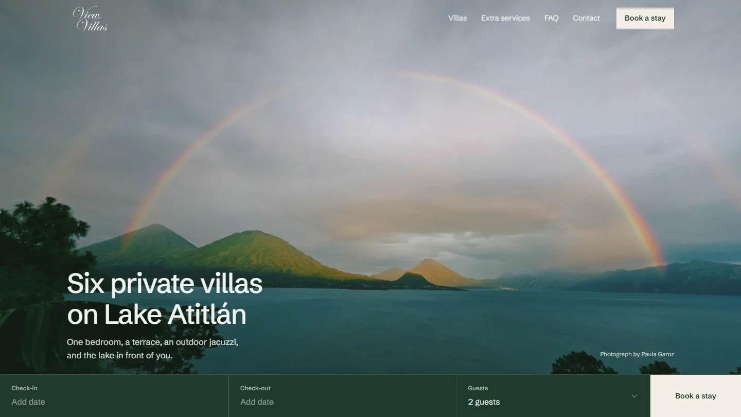 View Villas preview homepage showing Lake Atitlán and volcanoes with a direct booking bar